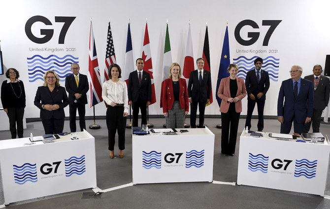 G7 Foreign and Development Ministers pose for a group photo in Liverpool, England Sunday, Dec. 12, 2021. (AFP)