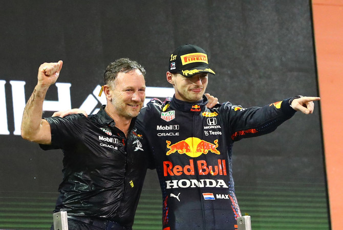 Red Bull driver Max Verstappen of the Netherlands celebrates after he became the world champion after winning the Formula One Abu Dhabi Grand Prix. (AP)