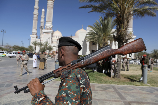 A police trooper ahead of funerals of Houthi fighters in Sanaa on December 6, 2021. (Reuters)