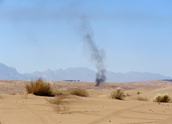 A picture taken from a Yemeni pro-government position shows smoke billowing during fighting with Houthis on the Al-Juba frontline south of Marib. (File/AFP)