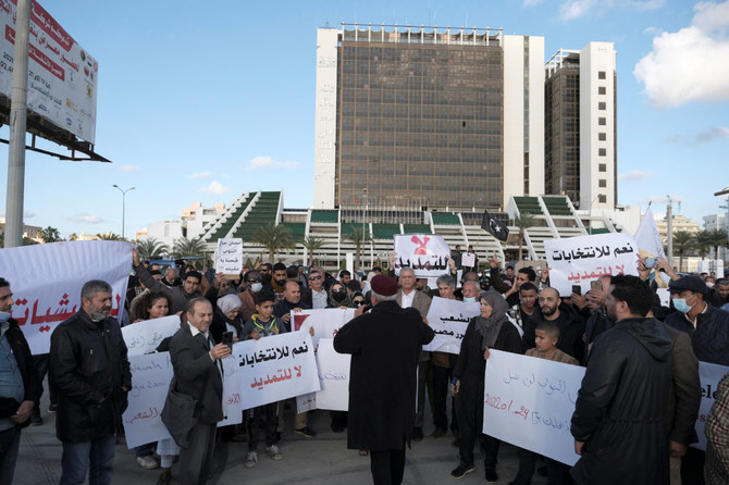 Libyans protest in Benghazi on Friday against the delay of the presidential election initially planned for Dec. 24, 2021. (REUTERS/Esam Omran Al-Fetori)