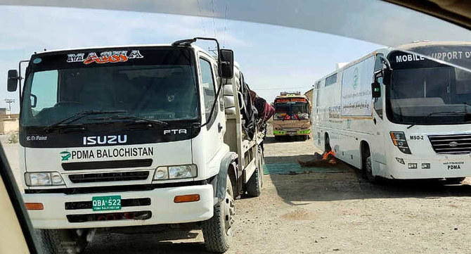 Mobile medical screening unit and cargo trucks park at the closed Pakistan-Iran border crossing, Feb. 25, 2020, in Taftan, Pakistan. (AP)