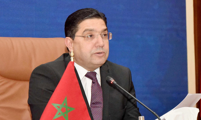Moroccan Foreign Minister Nasser Bourita, takes part in a virtual meeting with his US and Israeli counterparts, in his office in the capital Rabat, on December 22, 2021. (AFP)