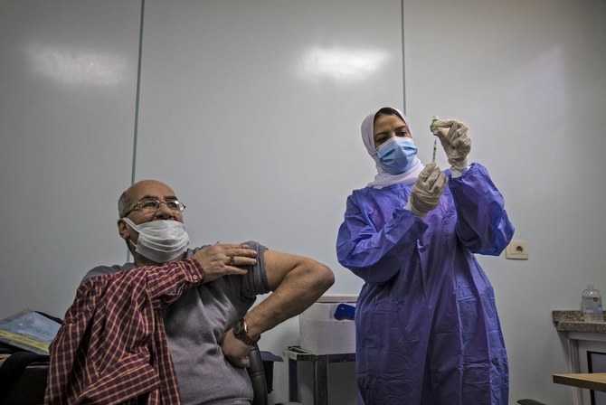 All adults in Egypt must get vaccinated against COVID-19 or lose their right to public services. (AFP)