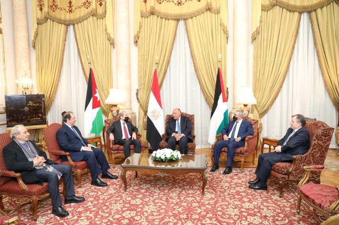 Egyptian, Jordanian and Palestinian officials discussed ways to enhance relations and efforts to strengthen Palestinian unity on Monday. (@MfaEgypt)