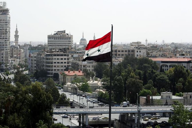 FILE PHOTO: A Syrian flag flutters in Damascus, Syria, April 20, 2018. (Reuters)