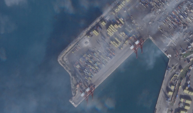 This satellite photograph taken by Planet Labs PBC show the smoldering wreckage after an Israeli strike on the port at Latakia, Syria, Wednesday, Dec. 29, 2021. (AP)
