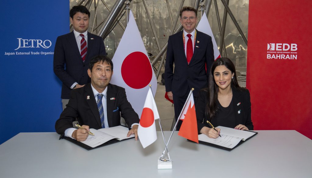 Bahrain EDB's Executive Director Dalal Buheji and JETRO's Managing Director Masami Ando signing an MoU to promote direct investments at the Bahrain Pavilion at Dubai Expo 2020. (Supplied)