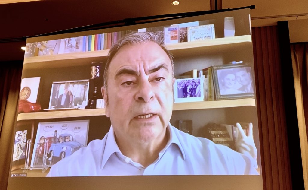 Former Nissan Motor Co. Chairman Carlos Ghosn (on screen) listens to a reporter's question during an online press conference at the Foreign Correspondents Club of Japan (FCCJ) in Tokyo on December 6, 2021. (ANJ Photo)