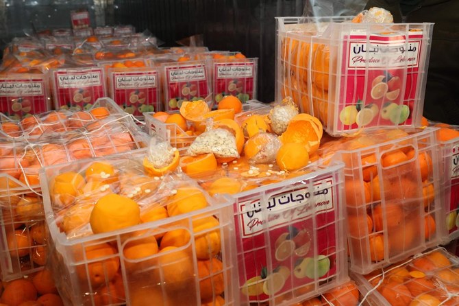Image shows fake oranges filled with Captagon pills that were dissimulated in boxes containing real fruit at the Beirut port, in the Lebanese capital, on December 29, 2021. (AFP)