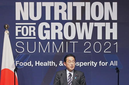 Japan's Prime Minister Fumio Kishida delivers a speech at the Tokyo Nutrition for Growth Summit in Tokyo, Japan, December 7, 2021. (Reuters)