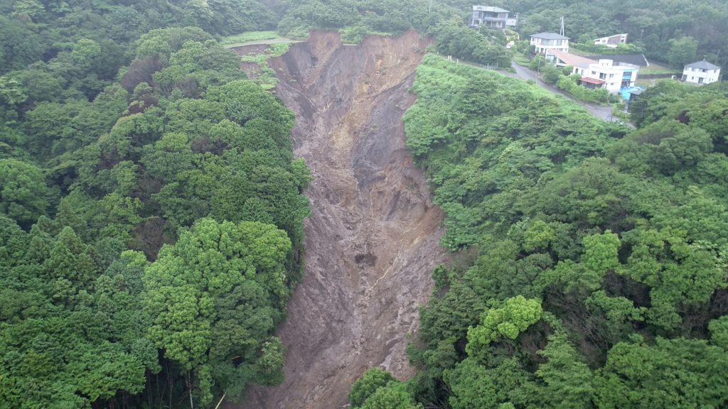They searched for the missing woman near her home and at a local port into which the mud flowed. A police helicopter hovered overhead to join the search. (AFP)