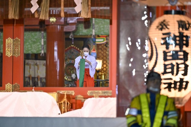 Shrine staff prepare for New Year prayers at Kanda Myojin Shrinein Tokyo. (AFP)