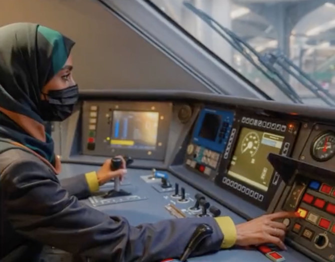 In this screen grab from a video posted on the Saudi Railway Polytechnic's Twitter account, a young Saudi woman undergoes training in the Haramain Express Train Leaders program. (Credit: @SRP_KSA video)