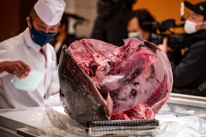 Above, the head of a tuna which was bought jointly by Michelin-starred sushi restaurant operator Onodera Group and wholesaler Yamayuki for $145,290 at the Toyosu fish market’s New Year auction. (AFP)