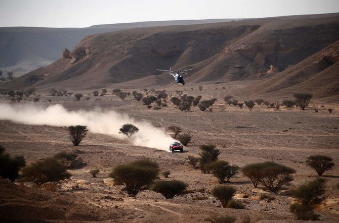 Spain's driver Nani Roma and co-driver Alex Haro Bravo of France ride during the Stage 6 of the Dakar 2021 near Riyadh, on January 7. (AFP)