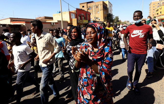 Protesters march during a rally against military rule, following last month’s coup in Khartoum on Thursday. (Reuters)