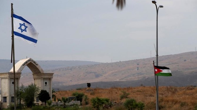 The national flags of Jordan and Israel are seen from the Israeli side of the border area between Israel and Jordan, Oct. 29, 2019. (Reuters)