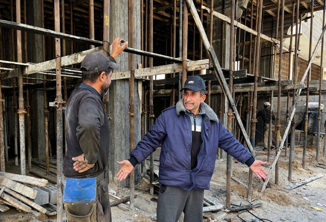 Palestinian Zeyad Abu Odah is one of the lucky few whose, homes are being restored. (Reuters)