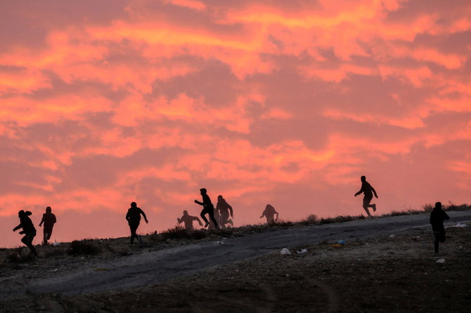 Israeli security forces clash with Bedouins during protest against forestation at the Negev desert village of Sawe Al-Atrash on Thursday. (Reuters)