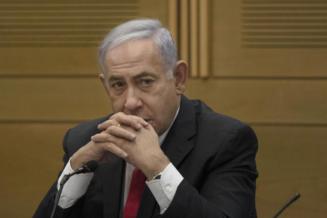 Former Israeli Prime Minister Benjamin Netanyahu speaks to right-wing opposition party members, at the Knesset, Israel's parliament, in Jerusalem on June 14, 2021. (AP)
