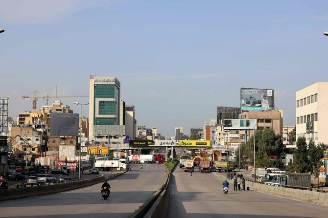 A picture shows a blocked road in Lebanon's capital Beirut during a general strike by public transport and workers unions over the country's economic crisis, on January 13, 2022. (AFP)