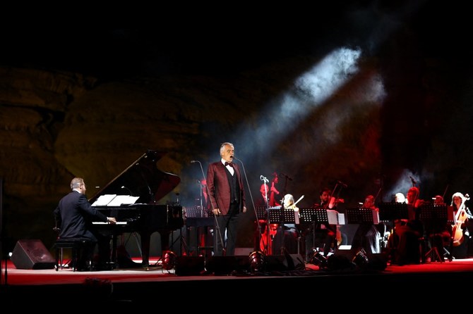 Italian tenor and opera singer Andrea Bocelli performs during a concert at the Hegra World Heritage Site in AlUla on April 8, 2021. (Royal Commission for AlUla/AFP)