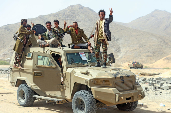 Fighters of the anti-Houthi group Giants Brigade patrol at the Harib junction of Bayhan district in Yemen’s Shabwa governorate. (AFP)