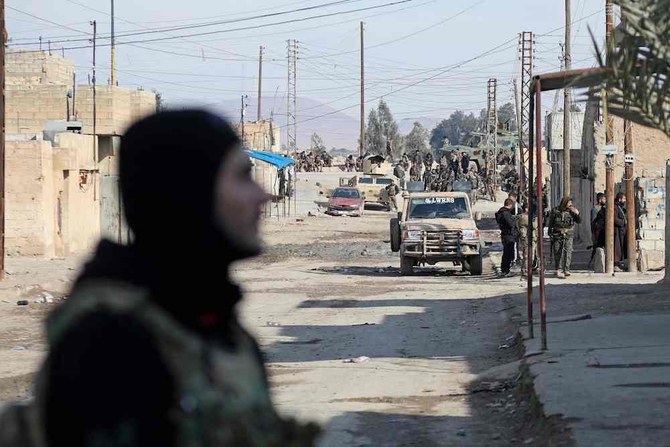 Kurdish security forces deploy in Syria's northern city of Hasakeh on January 22, 2022, amid ongoing fighting for a third day with Daesh extremists. (AFP)