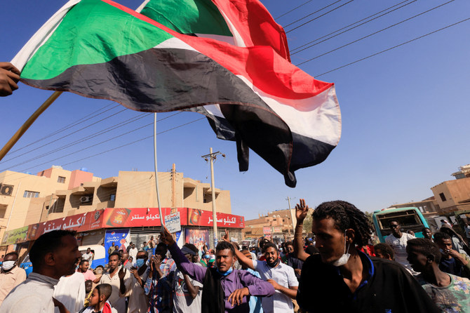 Protesters march during a rally against military rule following last month's coup in Khartoum, Sudan, January 24, 2022. (Reuters)