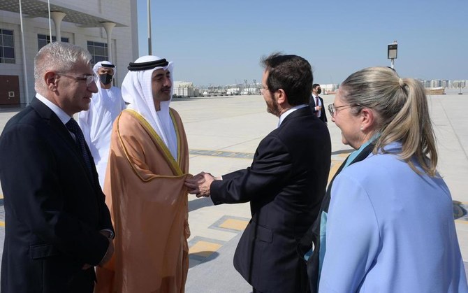 UAE Foreign Minister Sheikh Abdullah bin Zayed welcomes Israeli President Isaac Herzog. (Amos Ben-Gershom/ GPO)