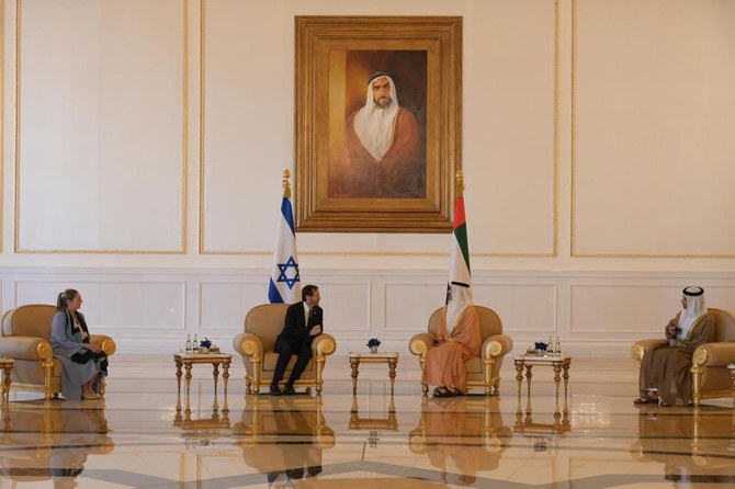 UAE Foreign Minister Sheikh Abdullah bin Zayed welcomes Israeli President Isaac Herzog. (Amos Ben-Gershom/ GPO)