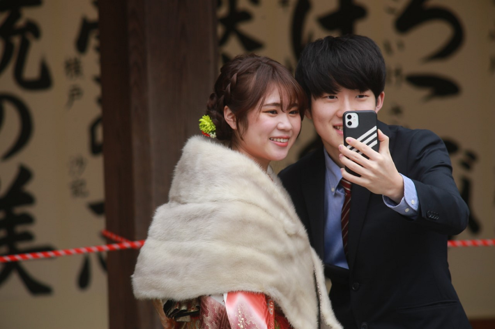 Monday was Coming-of-Age Day in Japan, which marks the passage from the teen years to adulthood with many new adults celebrating at the famous Meiji Shrine in central Tokyo. (ANJ/ Pierre Boutier)