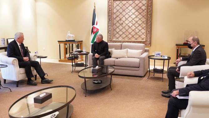 Jordan's King Abdullah II (C), accompanied by Foreign Minister Ayman Safadi (R), meets with Israeli Defence Minister Benny Gantz (L) in the capital Amman on January 5, 2022. (AFP)