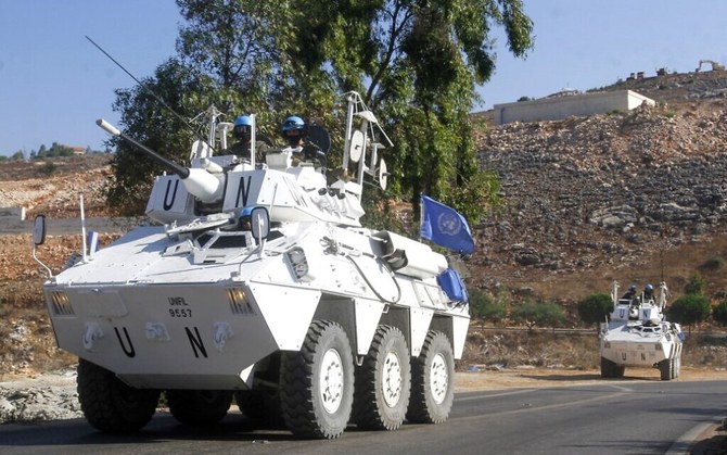 UNIFIL peacekeepers patrol near the village of Meiss El Jabal, along the southern Lebanese border with Israel, Aug. 26, 2020. (AFP)