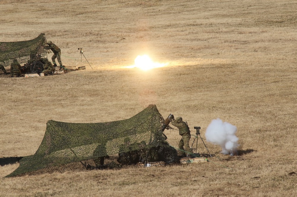 Paratroopers of Japan's First Elite Airborne Brigade put on a joint show of force with the United States at a training camp in Chiba Prefecture near Tokyo. (ANJ/ Pierre Boutier)