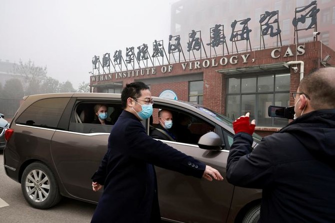 Peter Daszak and Thea Fischer, members of the WHO team investigating the origins of COVID-19, Wuhan, Hubei province, China, Feb. 3, 2021. (Reuters)