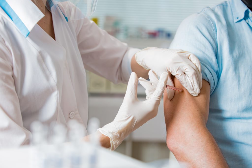 The research covered 65 doctors at Kobe University in their 20s to 60s who received a booster dose of US drug giant Pfizer Inc.'s COVID-19 vaccine in early December last year. (Shutterstock)
