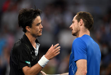 Britain's Andy Murray (right) congratulates Japan's Taro Daniel after their second round match. (Reuters)