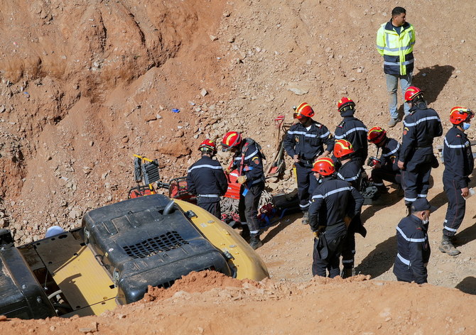 Rescuers work to reach a five-year-old boy trapped in a well in the northern hill town of Chefchaouen, Morocco on Feb. 5, 2022. (Reuters)