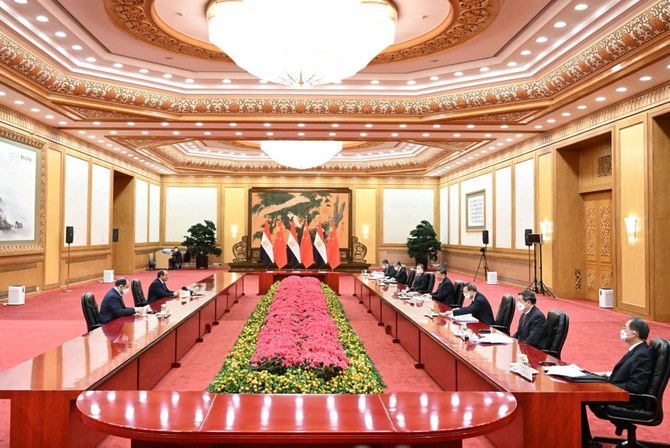 Egypt’s President Abdel Fattah El-Sisi meets Chinese President Xi Jinping. (Facebook/Egyptian Presidency Spokesman)