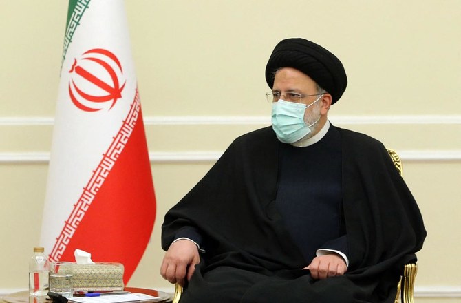 A handout picture provided by the Iranian presidency shows Iranian President Ebrahim Raisi during a meeting with Finland's foreign minister in Tehran on February 7, 2022. (AFP)
