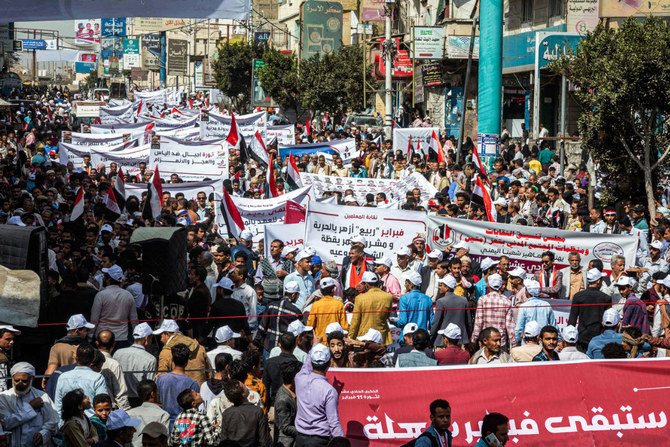 Yemenis gather for a rally in Taez city on Feb. 12, 2022, to commemorate the 11th anniversary of the 2011 Arab Spring uprising that toppled former President Ali Abdullah Saleh. (Photo by Ahmad Al-Basha / AFP)