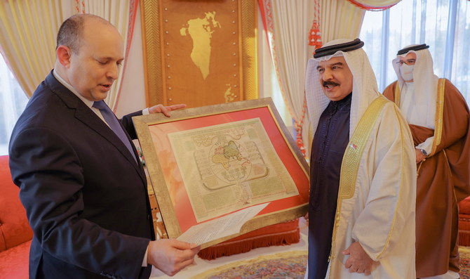 Bahrain’s King Hamad presents Israeli Prime Minister Naftali Bennett with a welcome gift at Sakhir Palace, Sakhir, Bahrain, Feb. 15, 2022. (Bahrain News Agency/Reuters)