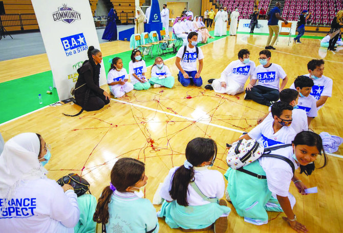 The students and the wrestlers coming together for activities in the anti-bullying campaign, ‘Be A Star,’ at King Abdullah Sports City Stadium. (Supplied)