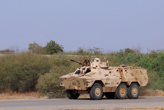 Yemeni pro-government fighters man a position during fighting to drive the Houthis from Haradh, Hajjah province. (File/AFP)