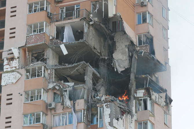 A view shows an apartment building damaged by recent shelling in Kyiv, Ukraine, on Feb. 26, 2022. (REUTERS/Gleb Garanich)