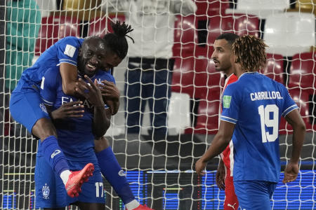 Al-Hilal’s Moussa Marega, 2nd left, celebrates after scoring his side’s fifth goal in the Club World Cup match against Al-Jazira, Mohammed Bin Zayed Stadium, Abu Dhabi, UAE, Feb. 6, 2022. (AP Photo)