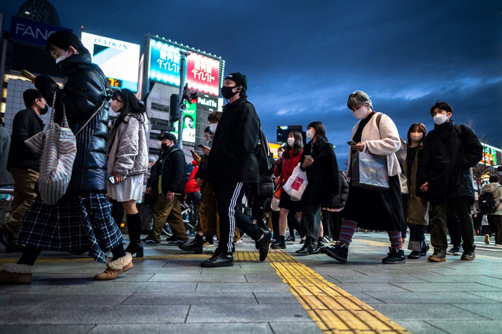 Japan confirmed 80,364 new COVID-19 cases on Wednesday, the first count above 80,000 in four days but a decrease of more than 10,500 from a week before. (AFP)