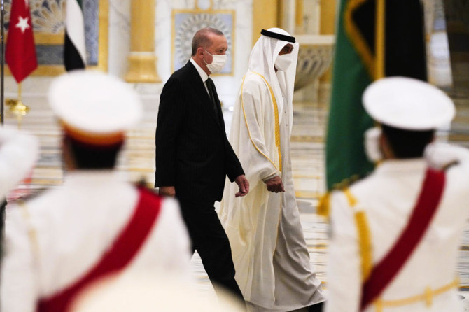 Turkish President Recep Tayyip Erdogan, left, and Abu Dhabi Crown Prince Sheikh Mohammed bin Zayed Al-Nahyan look over an honor guard at Qasr Al-Watan in Abu Dhabi, United Arab Emirates, Monday, Feb. 14, 2022. (AP)